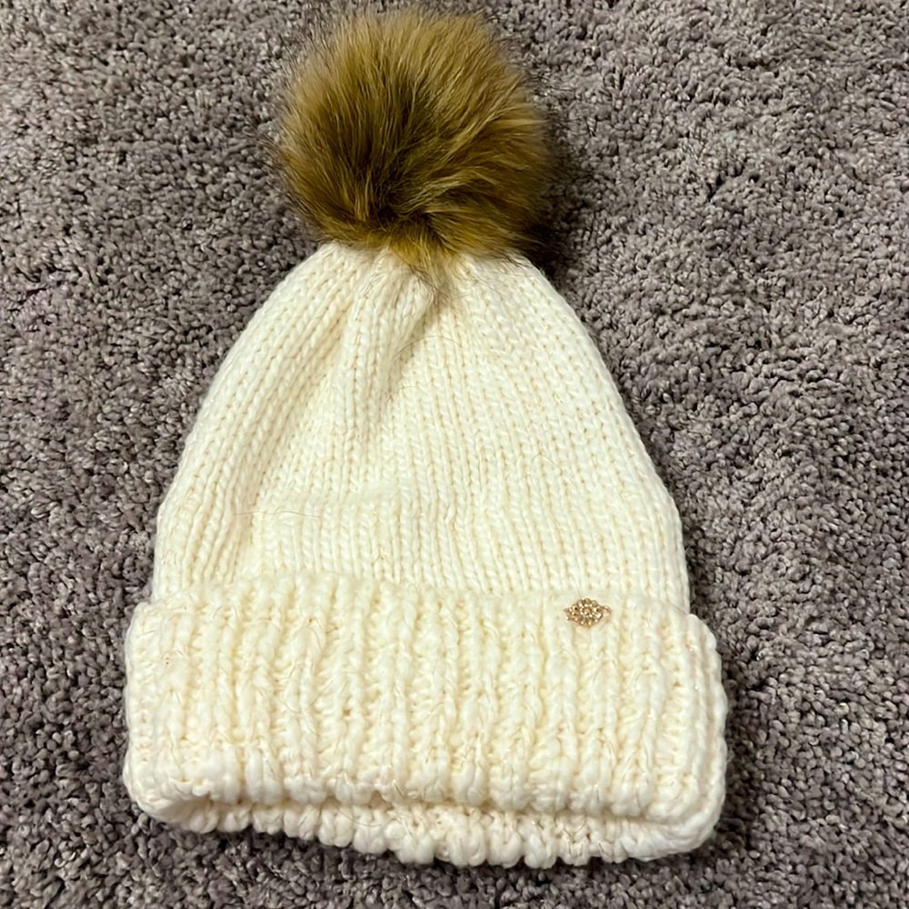White and gold winter hat